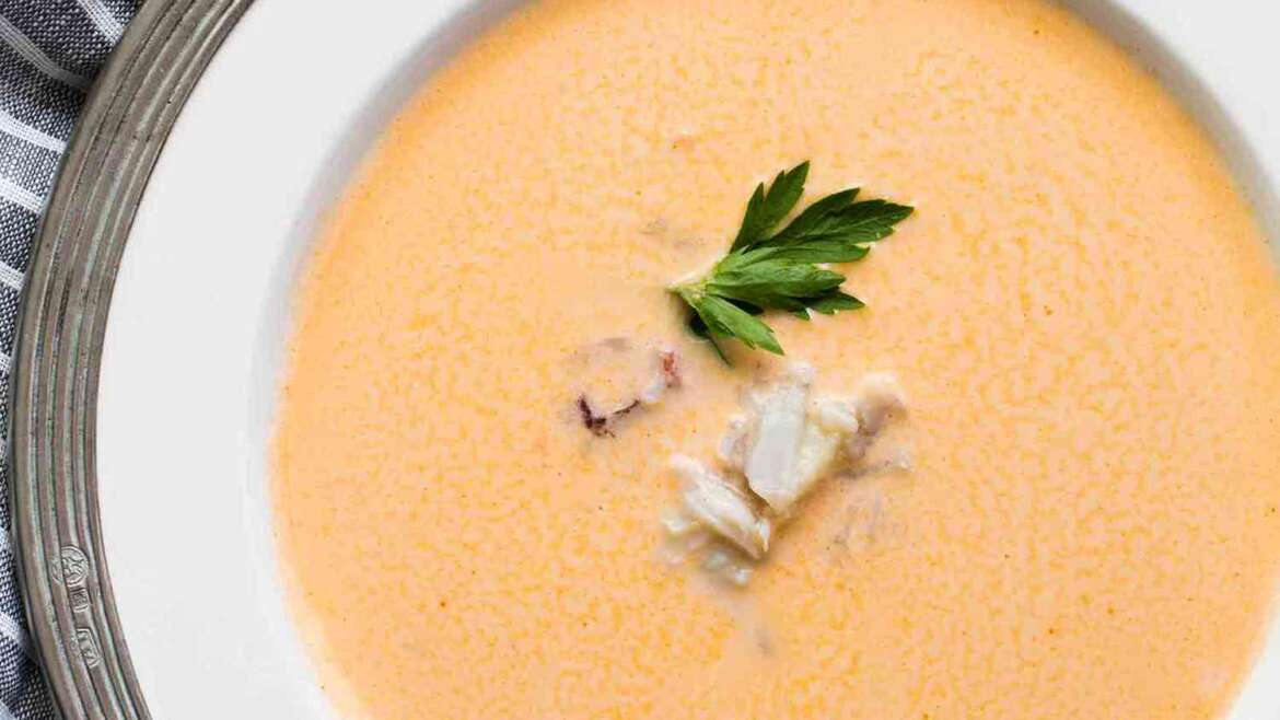 Crab Bisque with Saffron Aioli and Butter-Poached Crab Claw