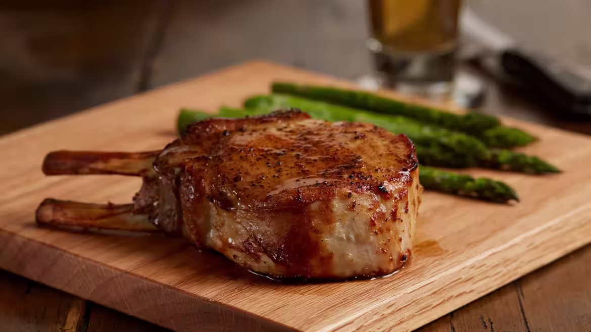 Maple-Brined Double Pork Chop with Maple Butter Glazed Carrots and Goat Cheese