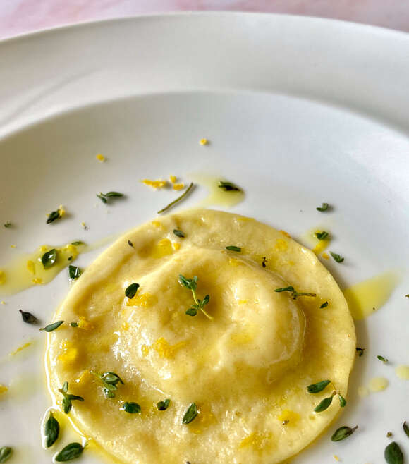 Cheese Raviolo in Lemon Sauce