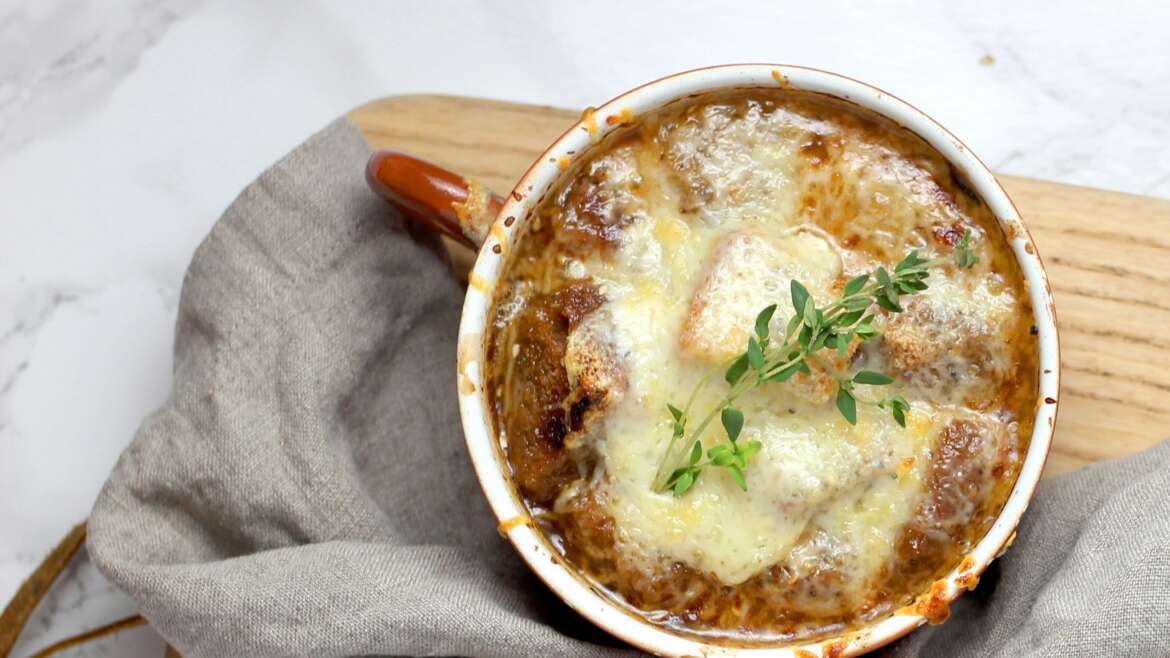 Onion Soup with Gruyère Crostini and Thyme-Infused Butter